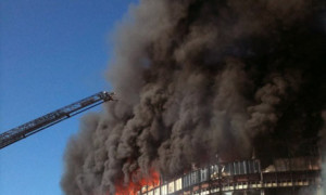 Small-planes-crashes-in-t-001 Billowing Black Smoke as Fire Rages